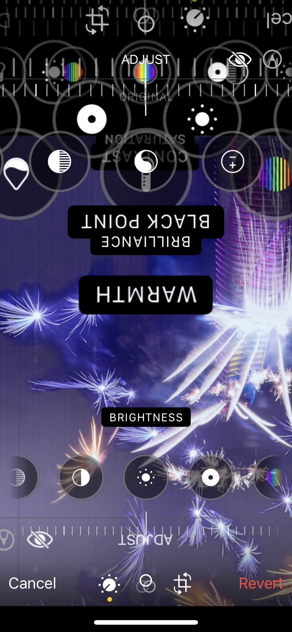 'No filter [Smiling emoji with halo]' panel 3. It's like panel 1, but showing a picture of a purple-blue night sky with fireworks coming from a skyscraper instead. The photo and some of the UI elements are clearly upside-down.
